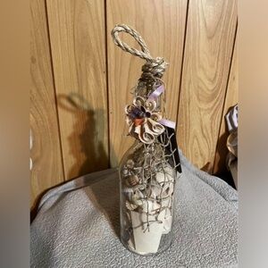 Decorative Seashell Bottle Chimes with Netting and Flower Accent